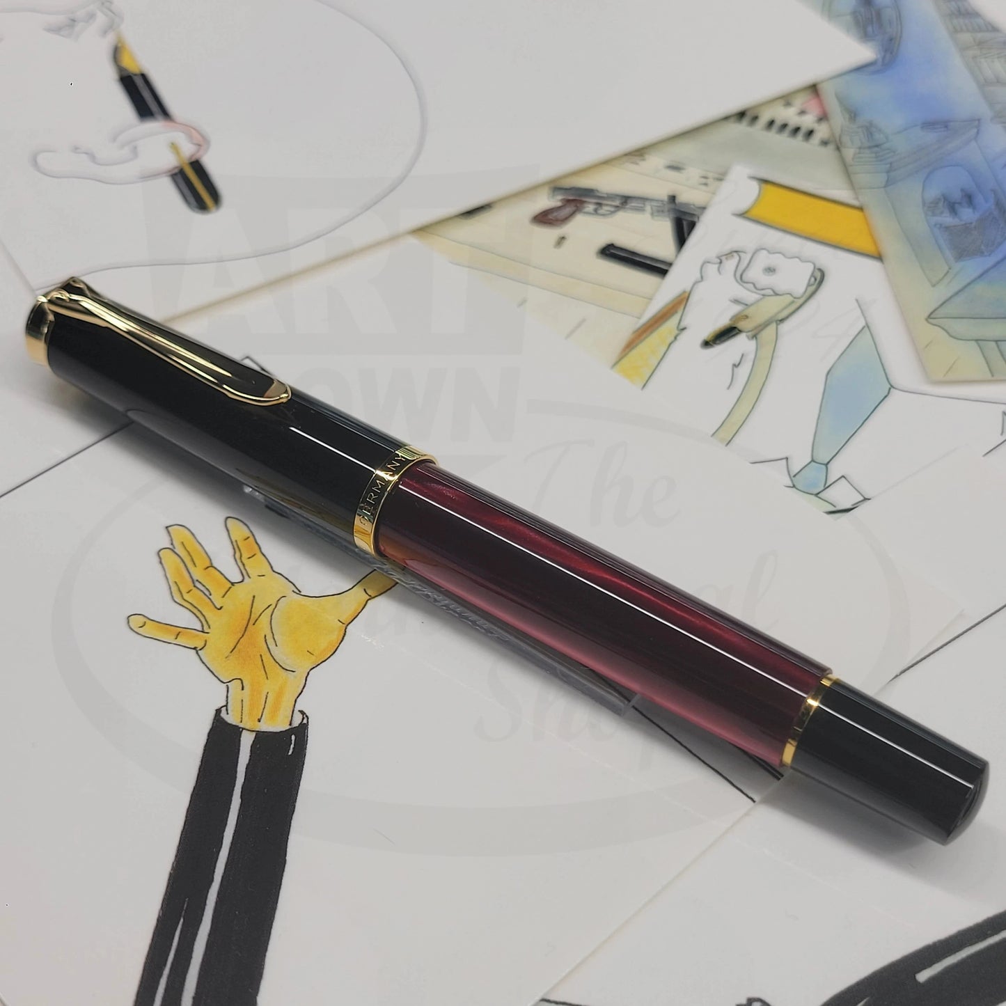 Pelikan Classic M200 827379 red marbled resin fountain pen with black cap and gold trim medium nib