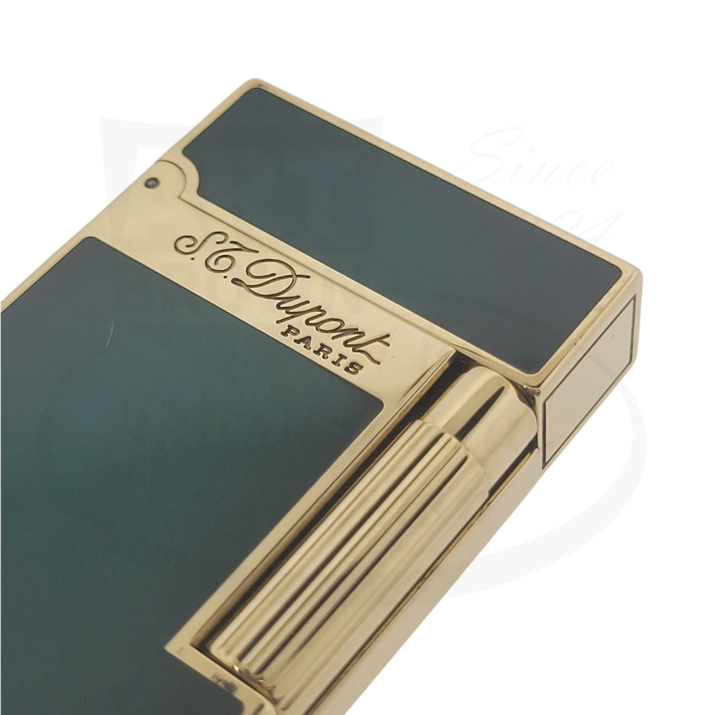 Preowned S.T. Dupont Ligne 2 Atelier Lighter 016303-D1 gold-plated brass sunburst green lacquer with a scratch on flint plate