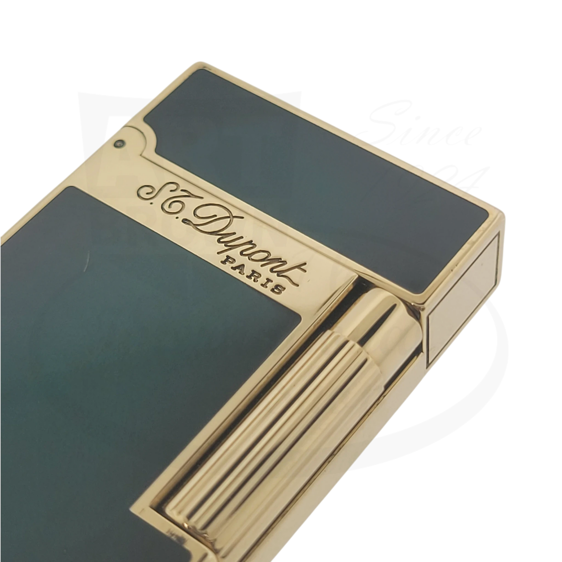 Preowned S.T. Dupont Ligne 2 Atelier Lighter 016303-D1 gold-plated brass sunburst green lacquer with a scratch on flint plate