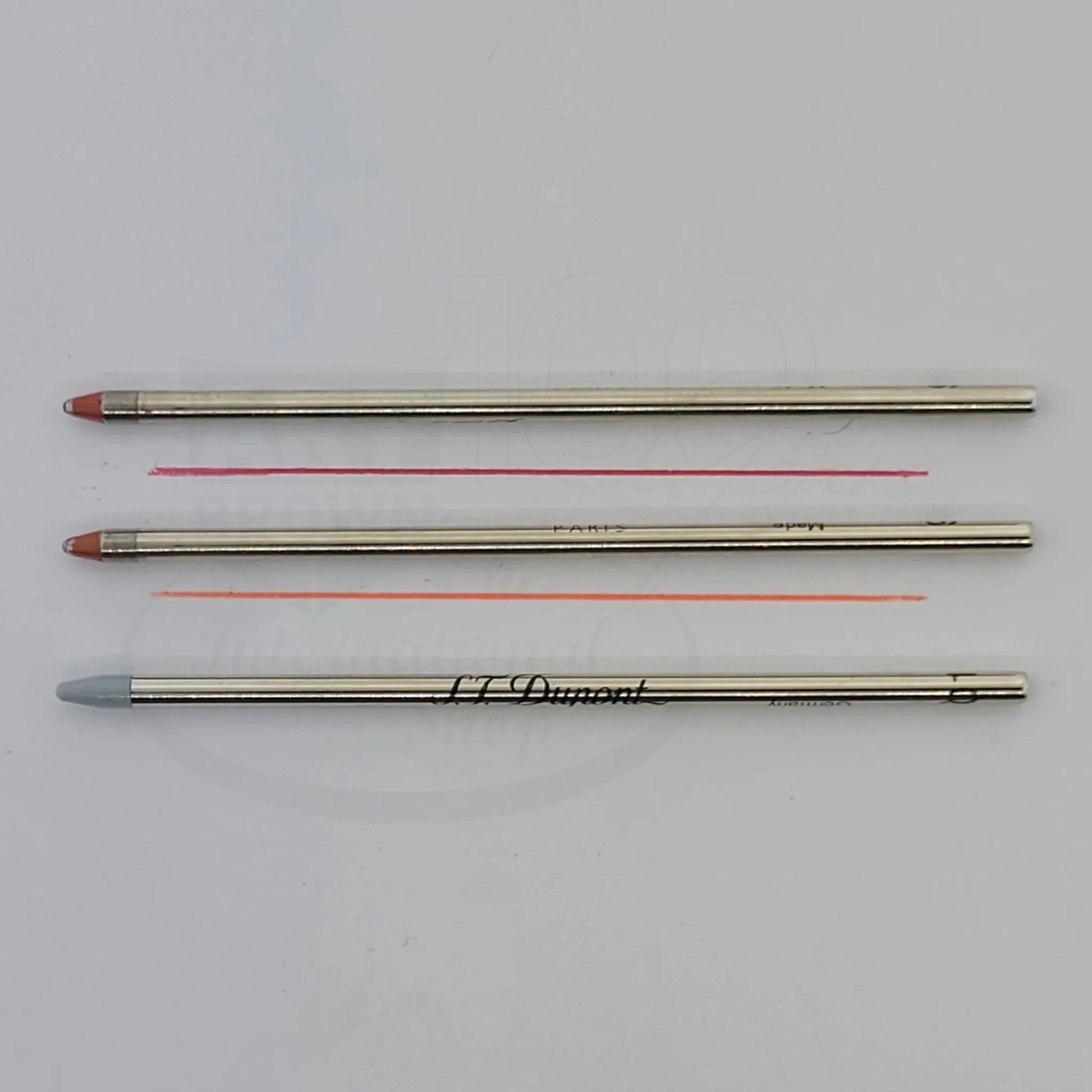 S.T. Dupont mini ballpoint refills, shown in red, orange, or as a stylus