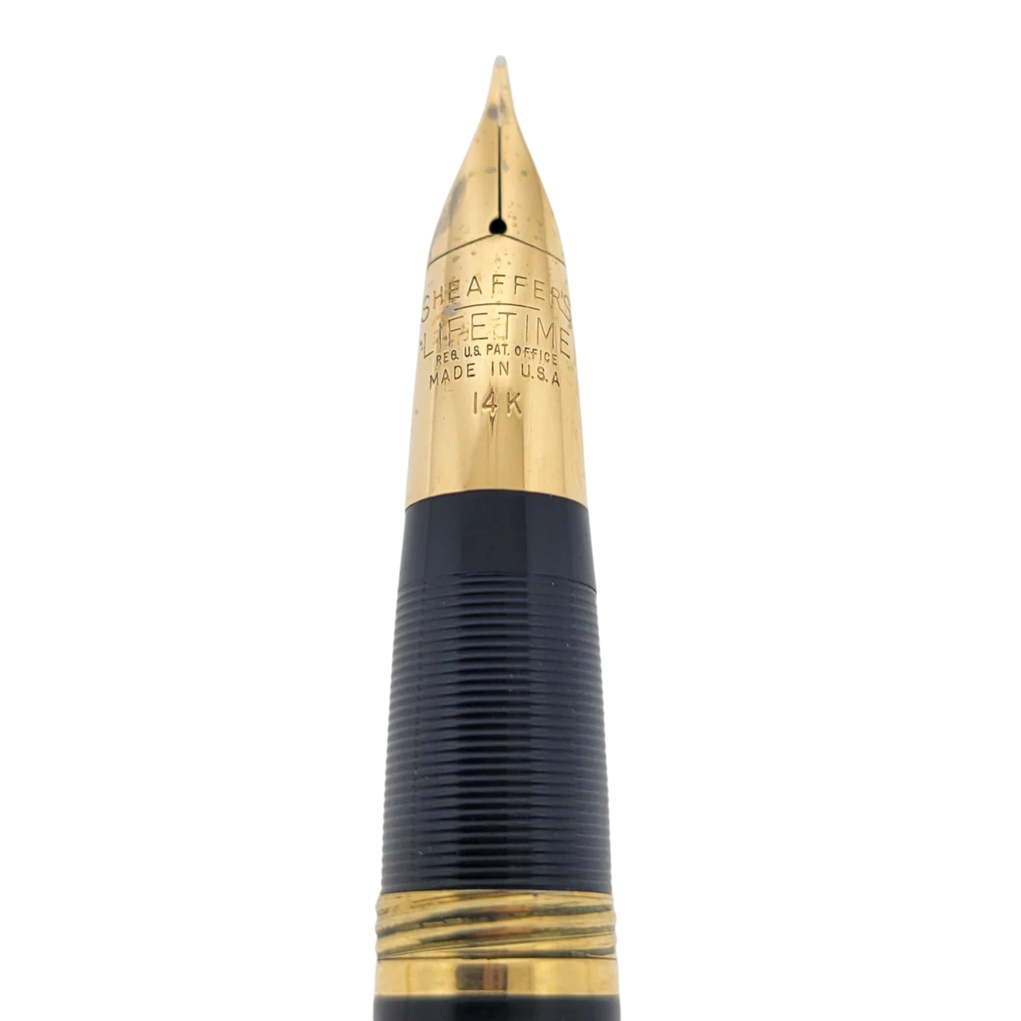 Sheaffer Snorkel fountain pen nib in solid 14K gold with vertical engraved lines and polished gold trim