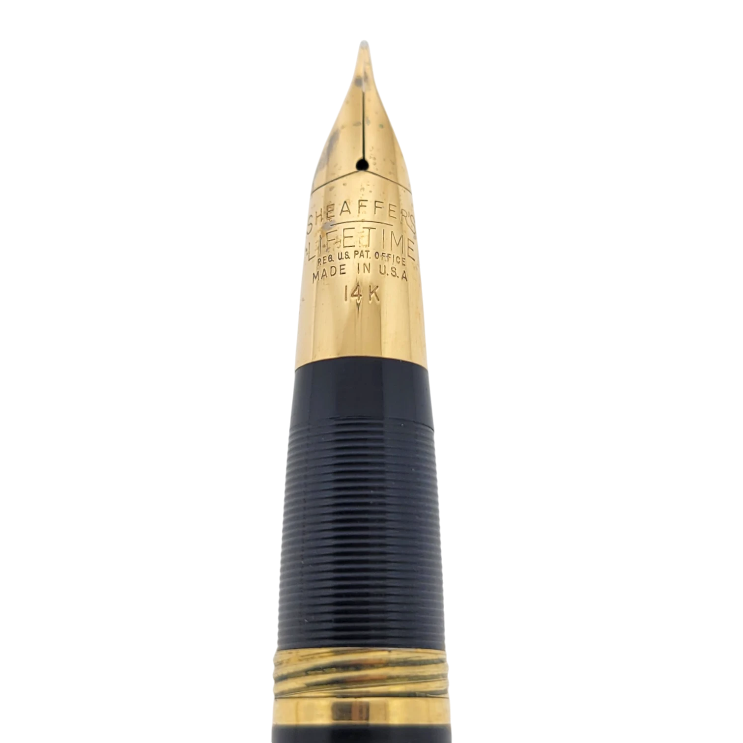 Sheaffer Snorkel fountain pen nib in solid 14K gold with vertical engraved lines and polished gold trim