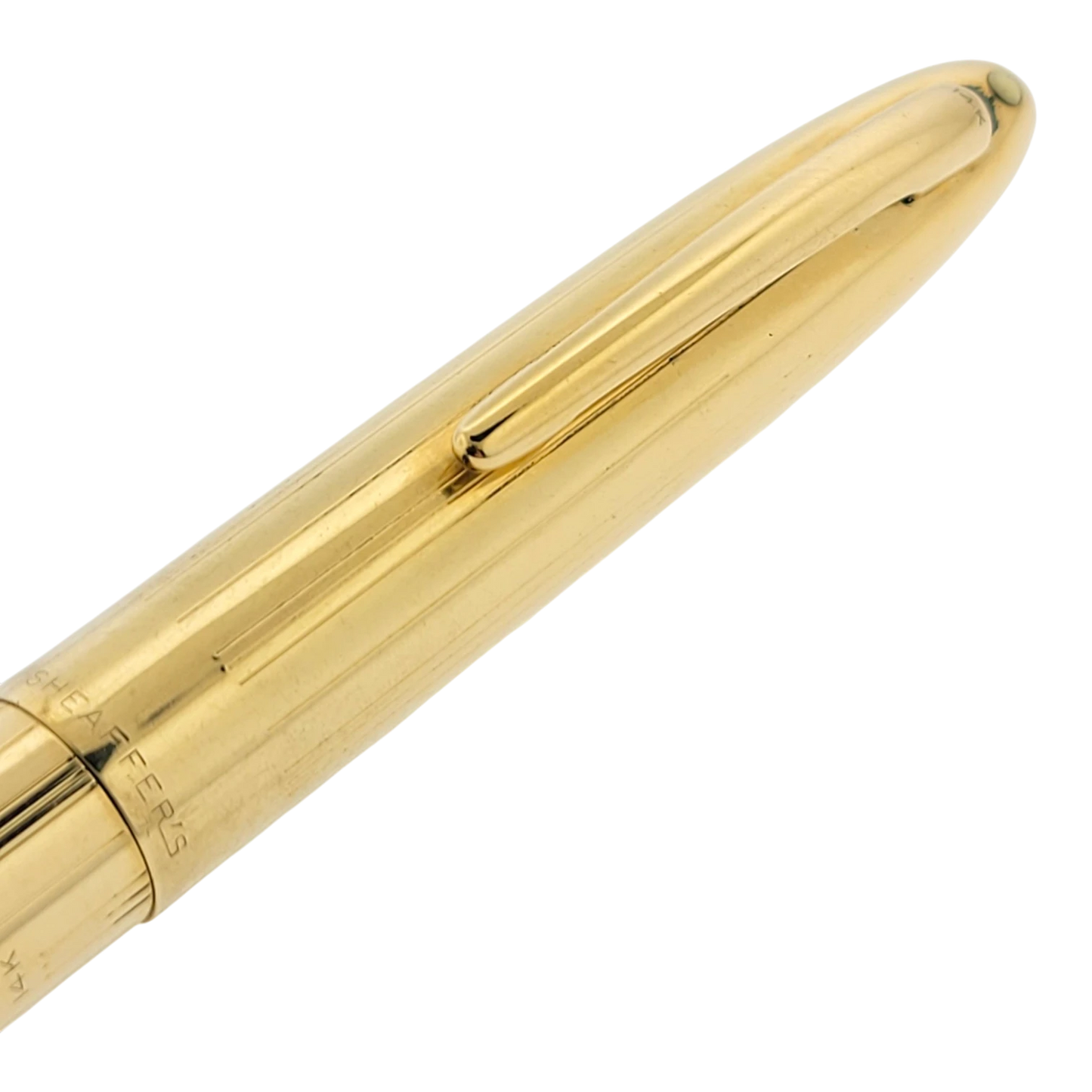Sheaffer Snorkel fountain pen in solid 14K gold with subtle vertical line guilloche and polished clip detail