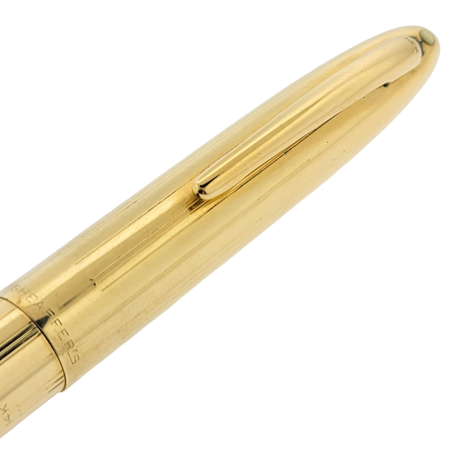 Sheaffer Snorkel fountain pen in solid 14K gold with subtle vertical line guilloche and polished clip detail