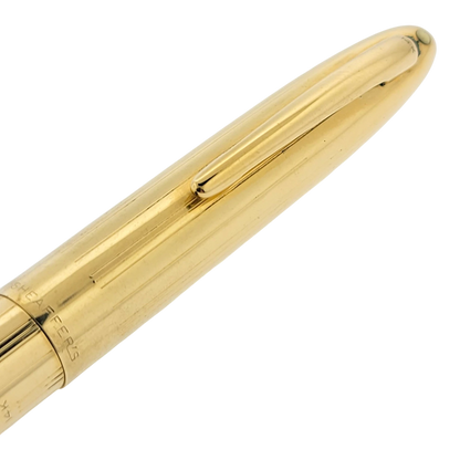 Sheaffer Snorkel fountain pen in solid 14K gold with subtle vertical line guilloche and polished clip detail