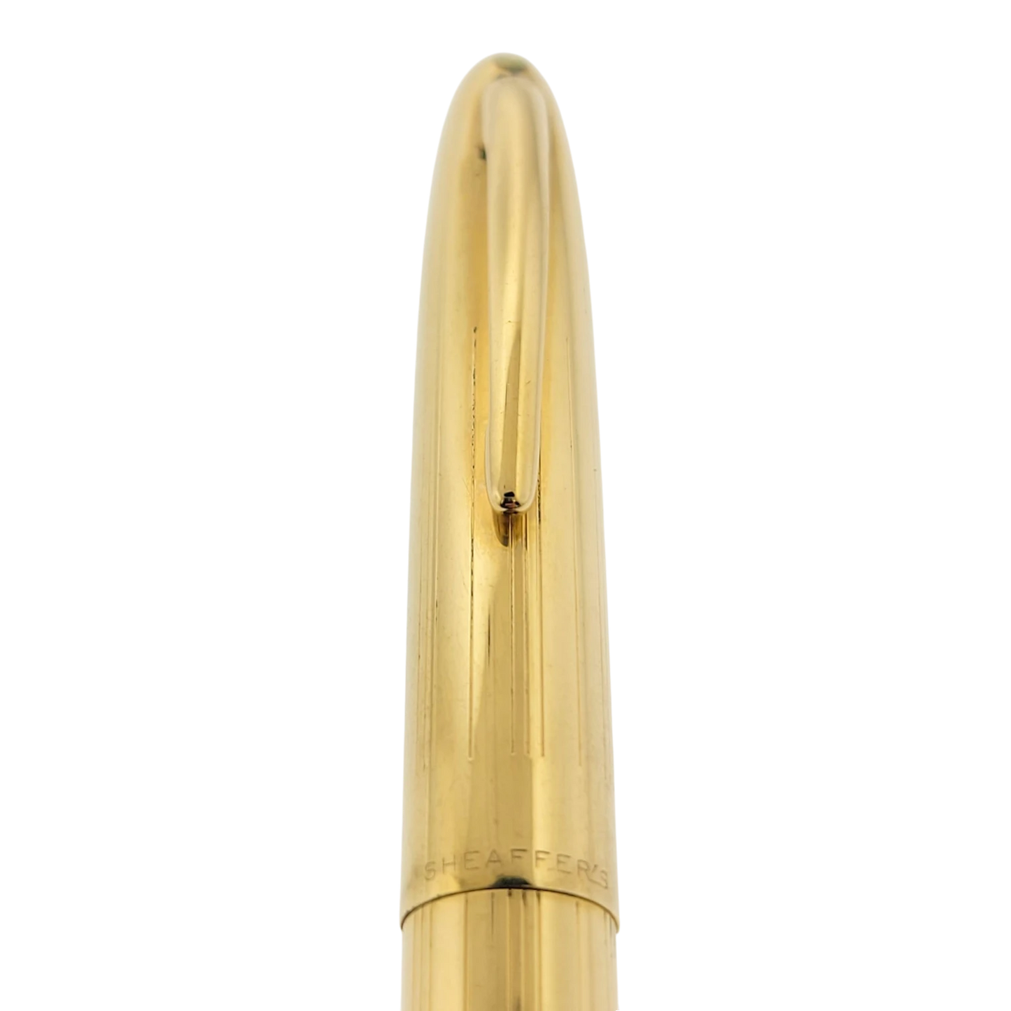 Sheaffer Snorkel fountain pen cap in polished solid 14K gold with vertical engraved lines and clip detail