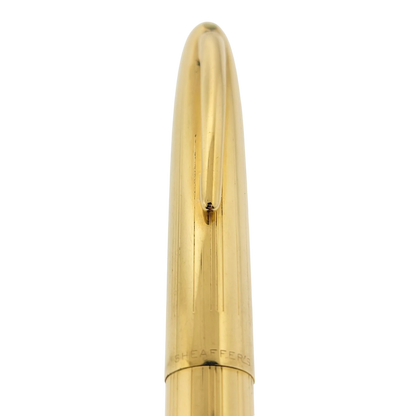 Sheaffer Snorkel fountain pen cap in polished solid 14K gold with vertical engraved lines and clip detail