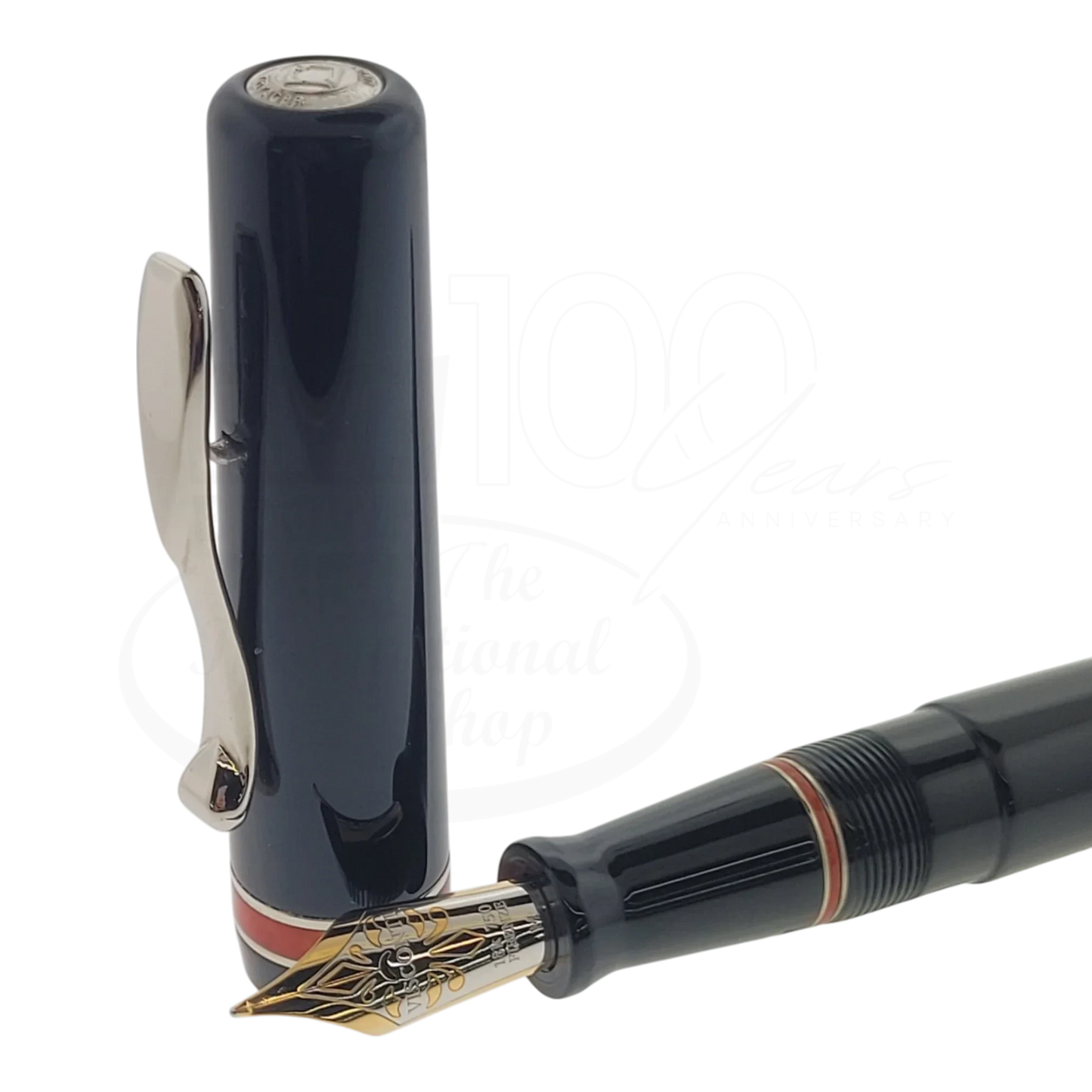 Preowned Visconti Voyager Midnight Coral Fountain Pen close-up of nib and cap with coral accent, gallery position 1 square image