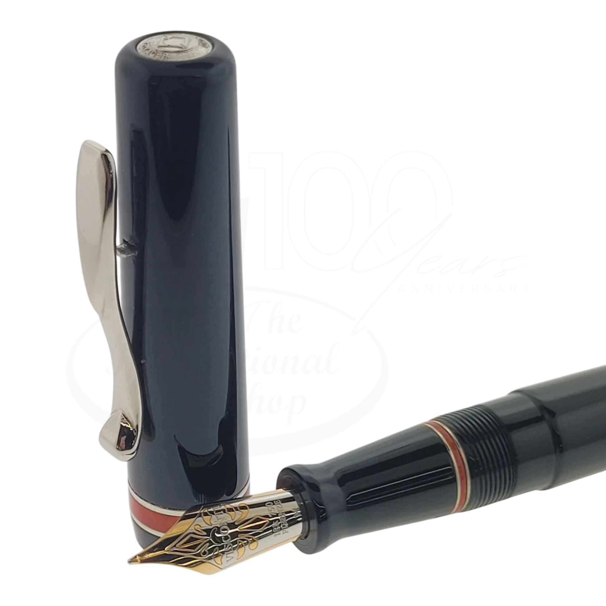 Preowned Visconti Voyager Midnight Coral Fountain Pen close-up of nib and cap with coral accent, gallery position 1 square image