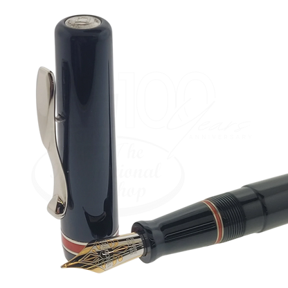 Preowned Visconti Voyager Midnight Coral Fountain Pen close-up of nib and cap with coral accent, gallery position 1 square image