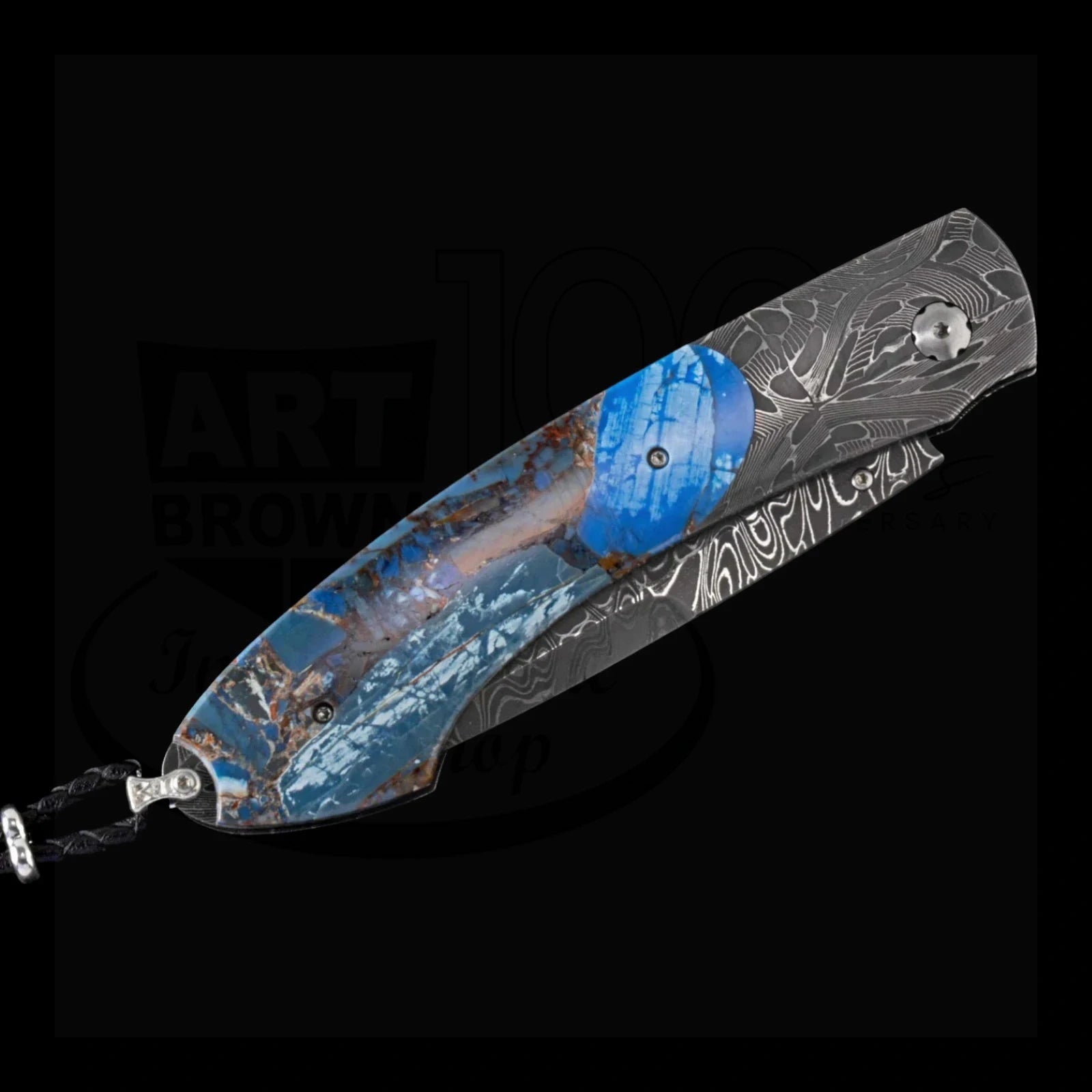 William Henry B12 Blue Fusion Spearpoint with patterned Damascus steel blade and blue mammoth tusk handle with lanyard loop