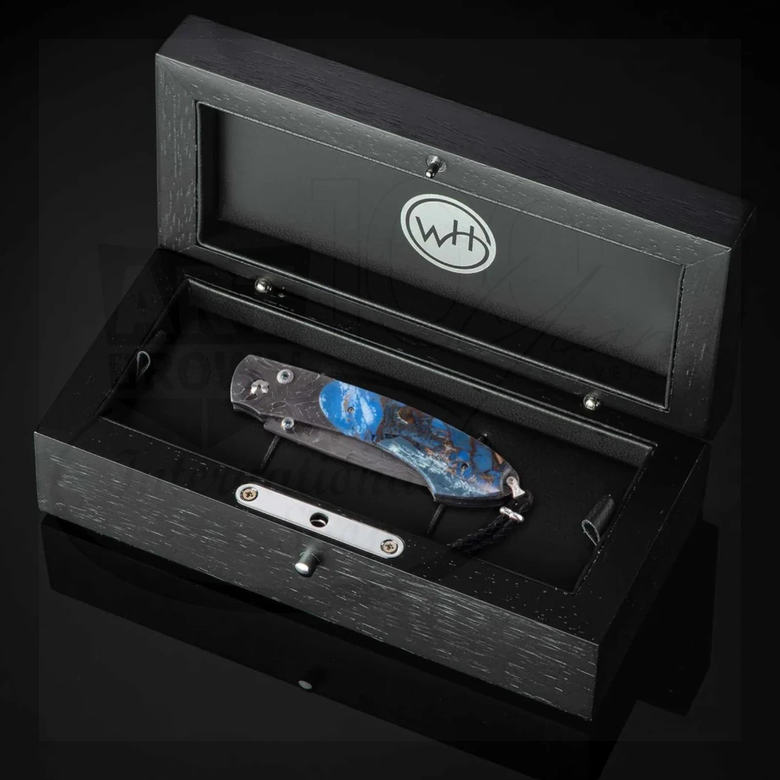 William Henry B12 Blue Fusion Spearpoint folding knife with blue resin and Damascus steel handle in black presentation box