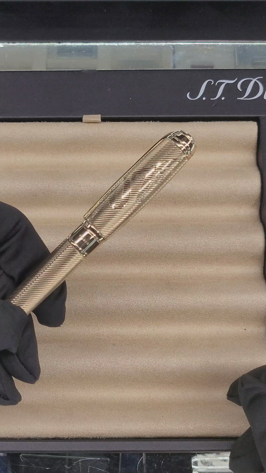 Video showcasing details of preowned S.T. Dupont 007 limited edition gold rollerball pen at Art Brown.