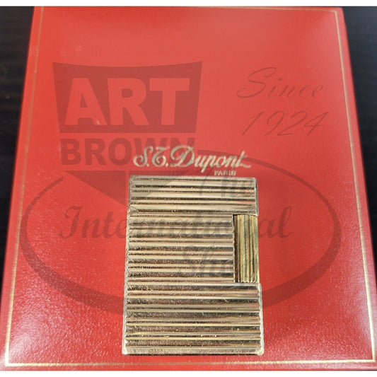 S.T. Dupont Line 1 Gold Horizontal Lines lighter in gold metal with original red packaging, vintage collectible item