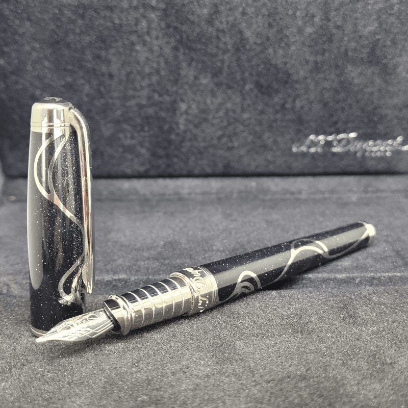 S.T. dupont Limited Edition Magic wishes fountain pen with black lacquer, palladium and silver dust finish open with cap