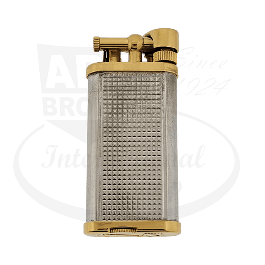 Dunhill Unique Model two-tone brass and silver hammer lighter with textured grid pattern body, gold-plated mechanisms, vintage refurbished condition
