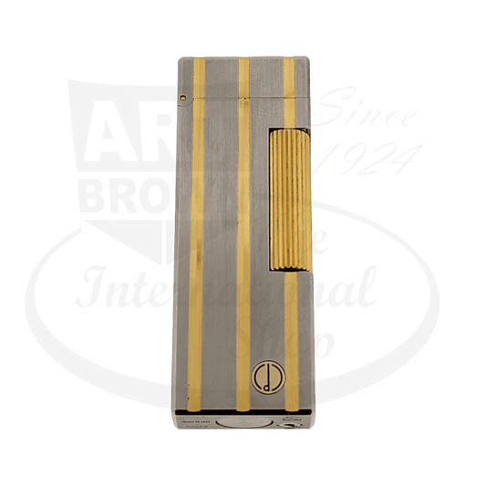 Dunhill Rollagas silver-plated metal lighter with vertical gold stripes, flint wheel ignition, and ribbed side panel, showcasing luxury Art Brown craftsmanship