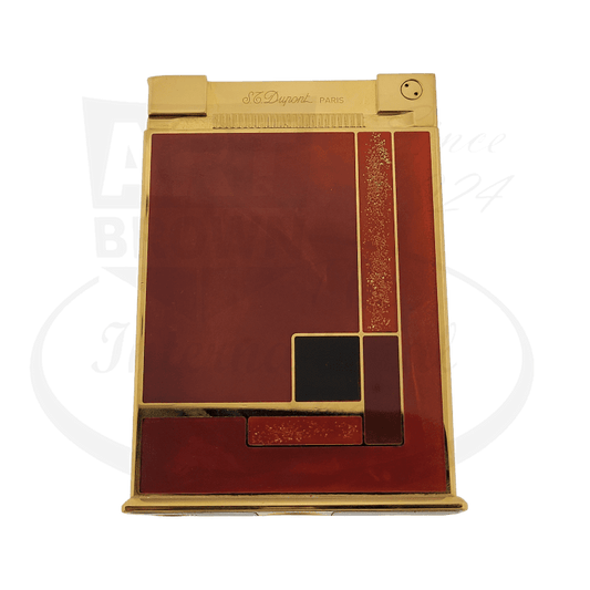 S.T. Dupont Jeroboam 027597 table lighter in gold-plated brass with burgundy Chinese lacquer and Art Deco geometric design featuring gold dust accents