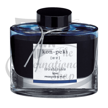 Pilot Iroshizuku kon-peki glass ink bottle, 50ml capacity, featuring blue liquid ink with black cap and silver ribbon accent, minimalist Japanese label design