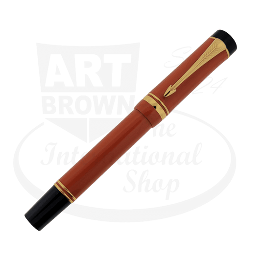 Parker Duofold Special Edition fountain pen in orange resin with gold-plated trim, medium 18k nib, classic cigar-shaped barrel design