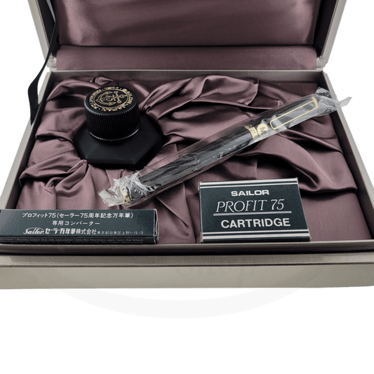 Sailor Profit 75 Carbon Fiber fountain pen set with black-gold nib, cartridges, converter, and ink well in luxury presentation box with silk lining
