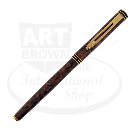 Waterman Ideal Exclusive fountain pen in cognac brown lacquer with tortoiseshell pattern, gold-plated trim, and slender vintage design, displayed diagonally